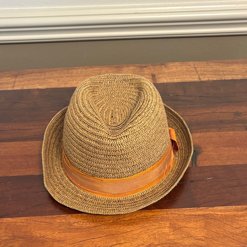 Elegant Tan Straw Hat with White Interior